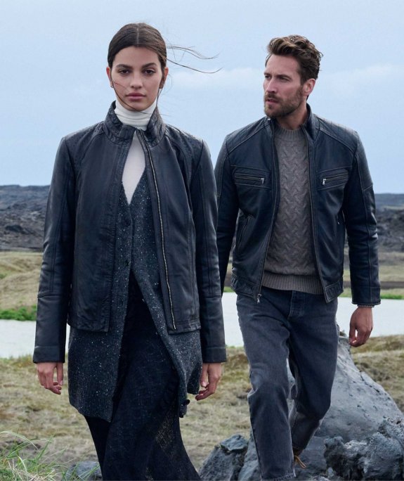 Couple wearing sheepskin coats - click to shop now